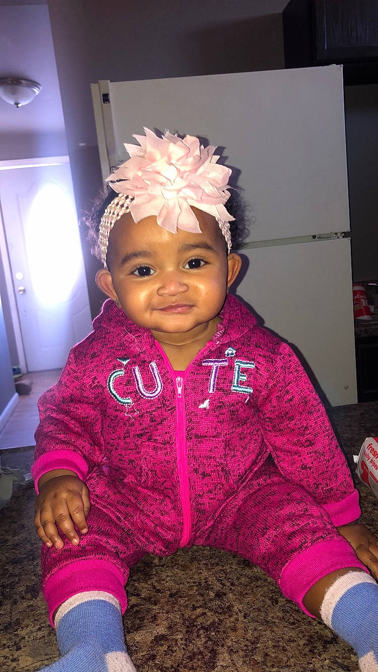 Ashanti joined the competition — help win amazing prizes! baby, child, hair_accessory, headgear, headwear, joy, magenta, outerwear, person, pink, smile, toddler