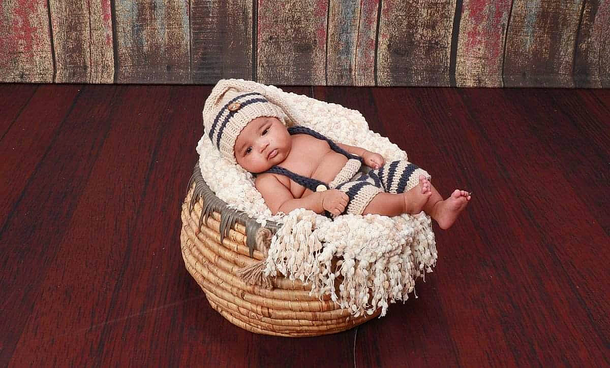 Noel joined the competition — help win amazing prizes! baby, baby_toddler_clothing, basket, child, comfort, fashion_accessory, flooring, grass, happy, hardwood, headgear, headwear, laminate_flooring, linens, person, sitting, storage_basket, toddler, wood, wood_flooring