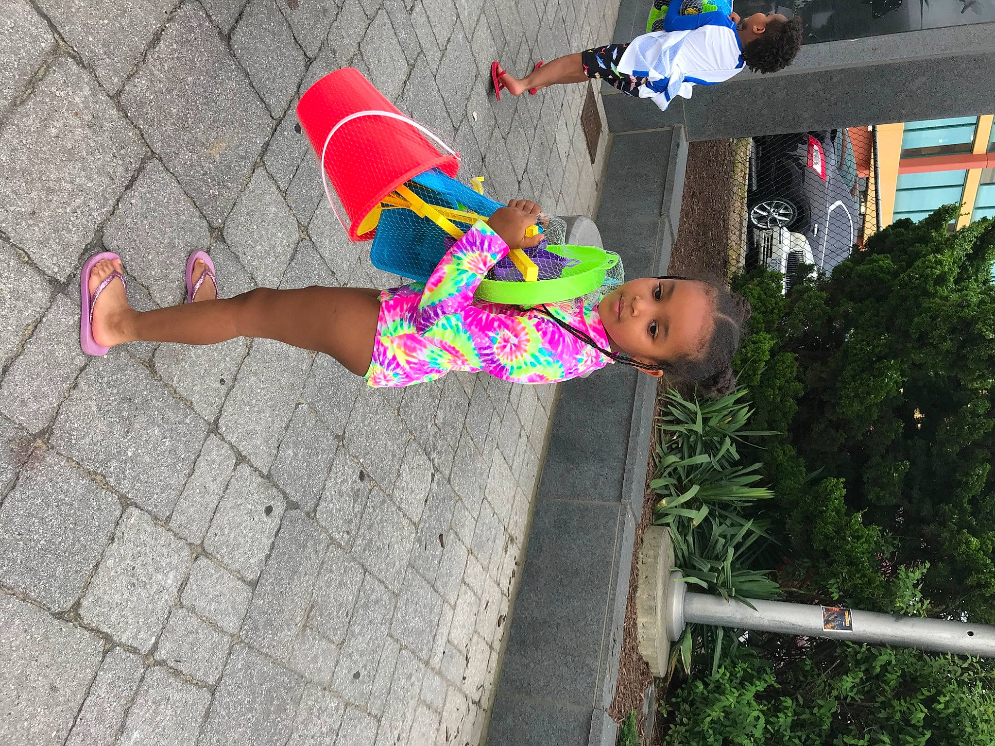 Herani joined the competition — help win amazing prizes! calf, concrete, flooring, footwear, fun, grass, green, human_leg, knee, leisure, line, magenta, pattern, person, plant, sandal, sidewalk, thigh, toddler, tree