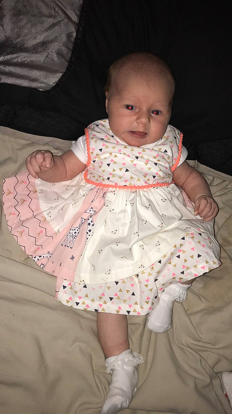 Maisie joined the competition — help win amazing prizes! baby, baby_products, baby_toddler_clothing, child, design, dress, iris, pattern, person, pink, polka_dot, product, skin, textile, toddler