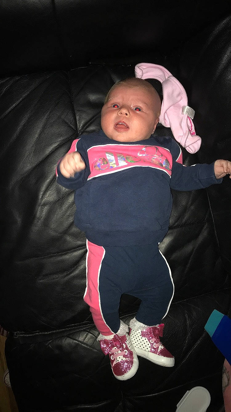 Maisie is registered to the contest to win money with this photo: baby, baby_products, child, cool, fun, outerwear, person, photography, pink, product, skin, smile, t_shirt, toddler