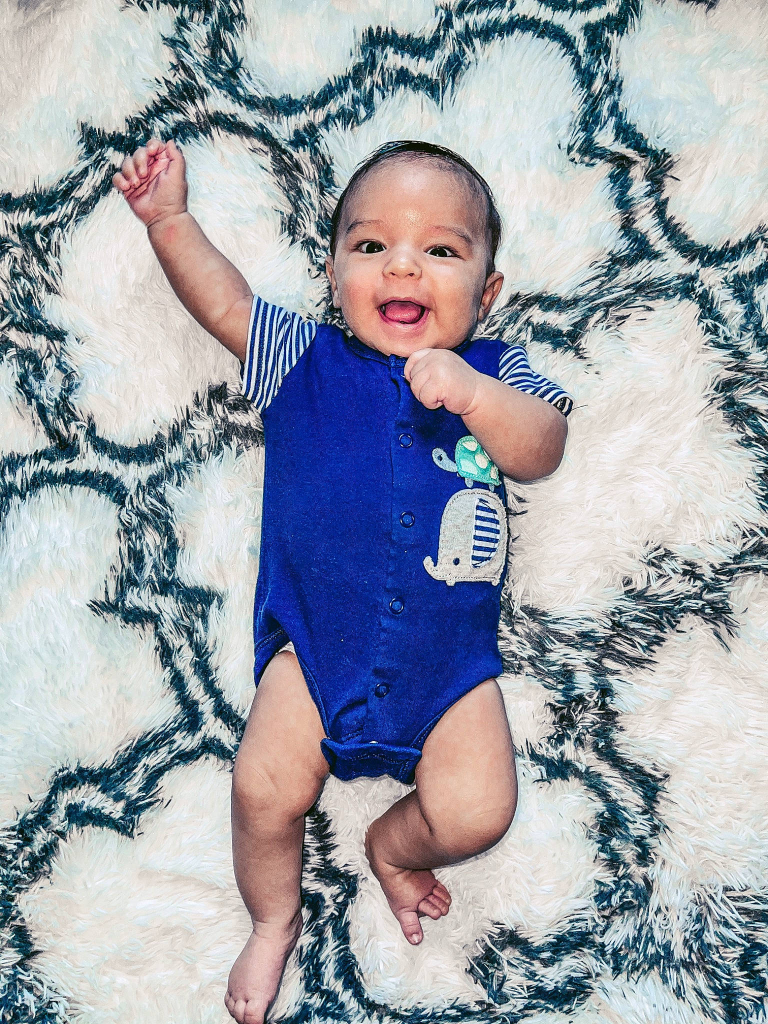 Cinch is registered to the contest to win money with this photo: aqua, arm, azure, baby, baby_toddler_clothing, eye, finger, gesture, happy, head, human_body, neck, organ, person, skin, sleeve, smile, stomach, textile, thigh