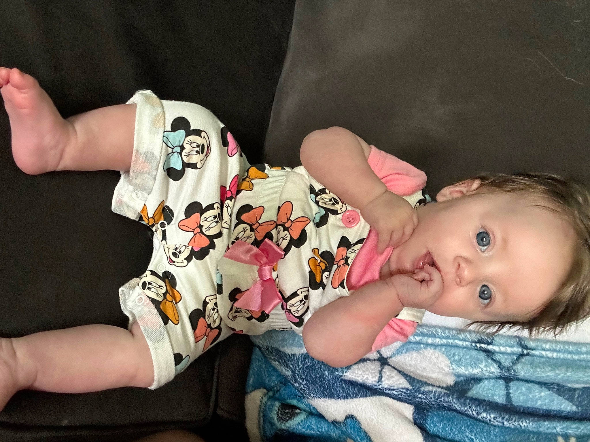 Paisley is registered to the contest to win money with this photo: baby, baby_toddler_clothing, cheek, child, comfort, elbow, eyelash, fun, happy, human_leg, joint, knee, linens, nail, pattern, person, sitting, sleeve, surprise, thigh