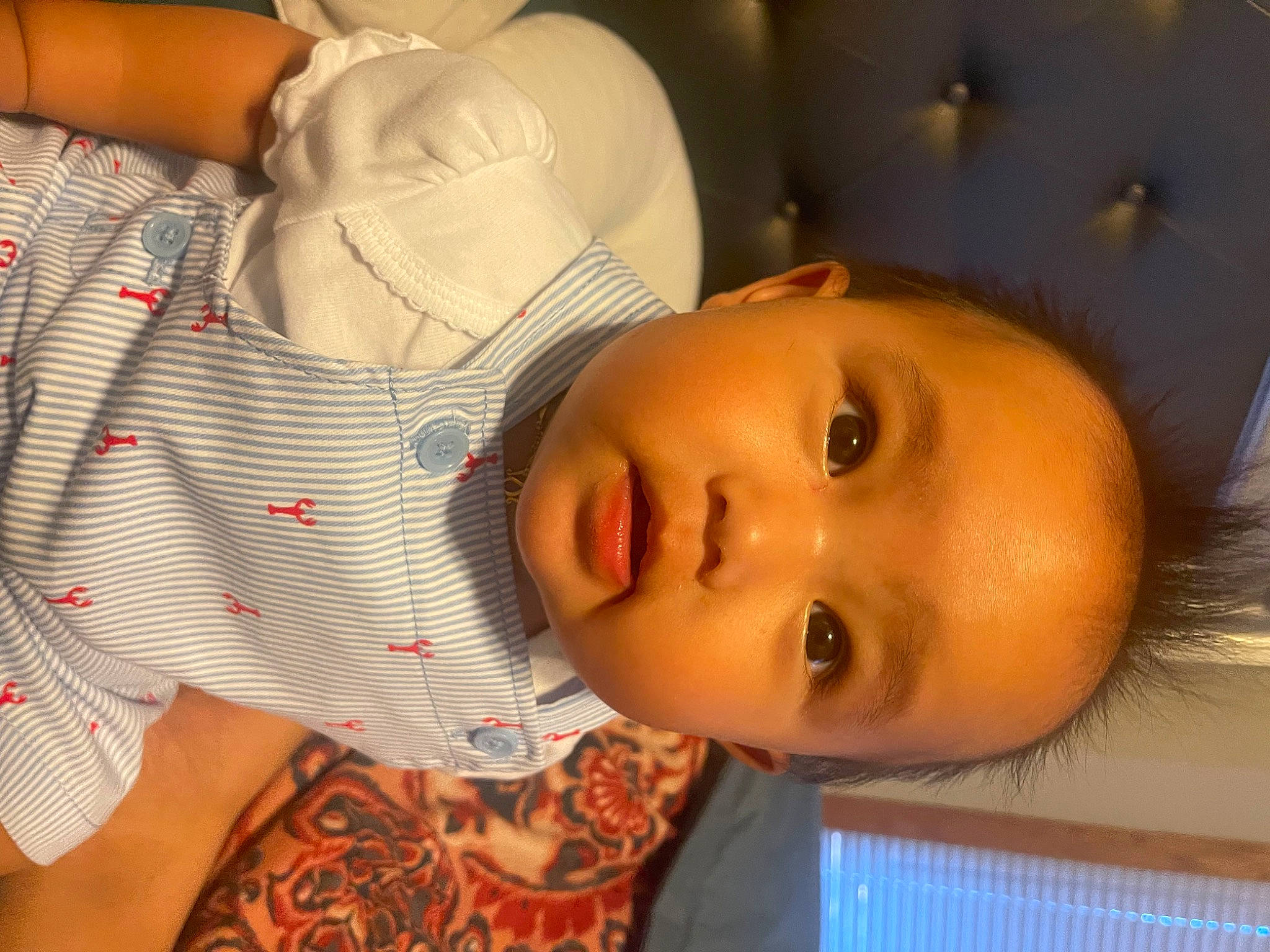 Rosetta is registered to the contest to win money with this photo: baby, cheek, chest, child, comfort, eyelash, fun, happy, human_body, iris, lip, mammal, mouth, nose, pattern, person, skin, smile, textile, toddler