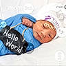 Kaleb is registered to the contest to win money with this photo: newborn, baby, blue_blanket, white_hat, hospital, sign, chalkboard, hello_world, bed, infant, wrapped, lying_down, face, peaceful, awake, skin, person, portrait, watermark, indoors