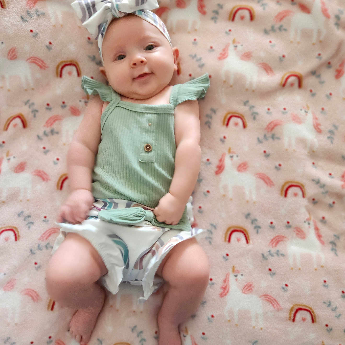 Phoebe joined the competition — help win amazing prizes! baby, bed, blanket, bodypart, bonnet, clothing, diaper, face, finger, furniture, hand, hat, head, newborn, person, photography, portrait, quilt, shorts, sitting