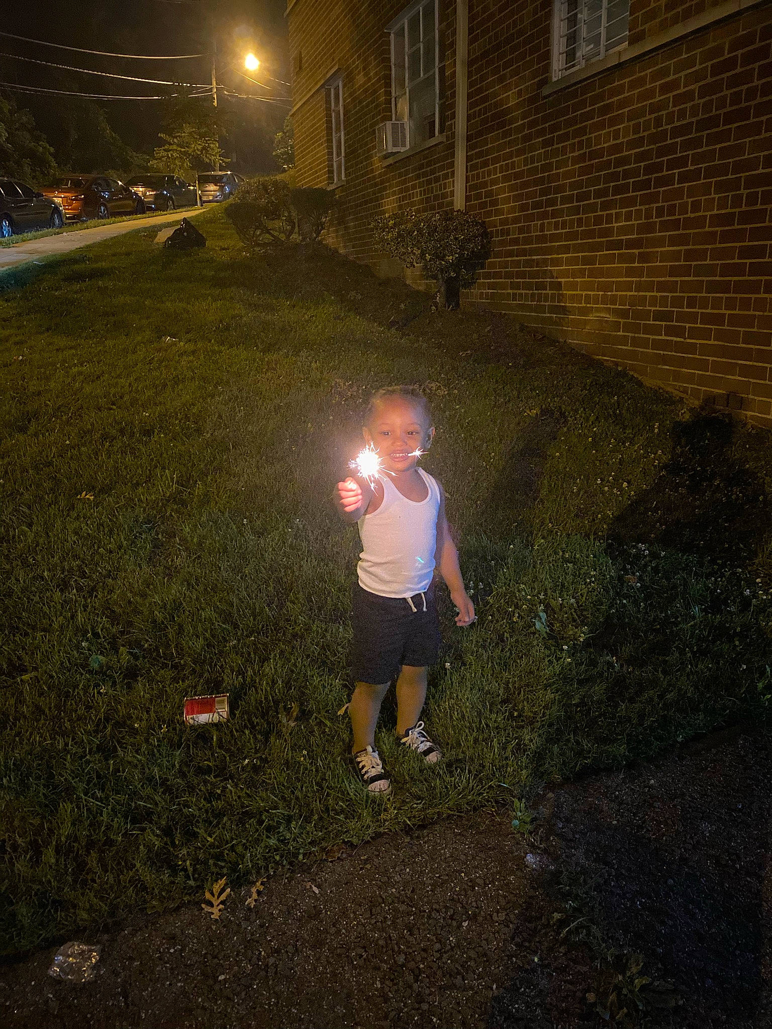 Tyler joined the competition — help win amazing prizes! asphalt, automotive_lighting, darkness, flash_photography, flooring, grass, grassland, landscape, midnight, people_in_nature, person, plant, recreation, road, road_surface, shorts, sky, street_light, tints_and_shades, toddler