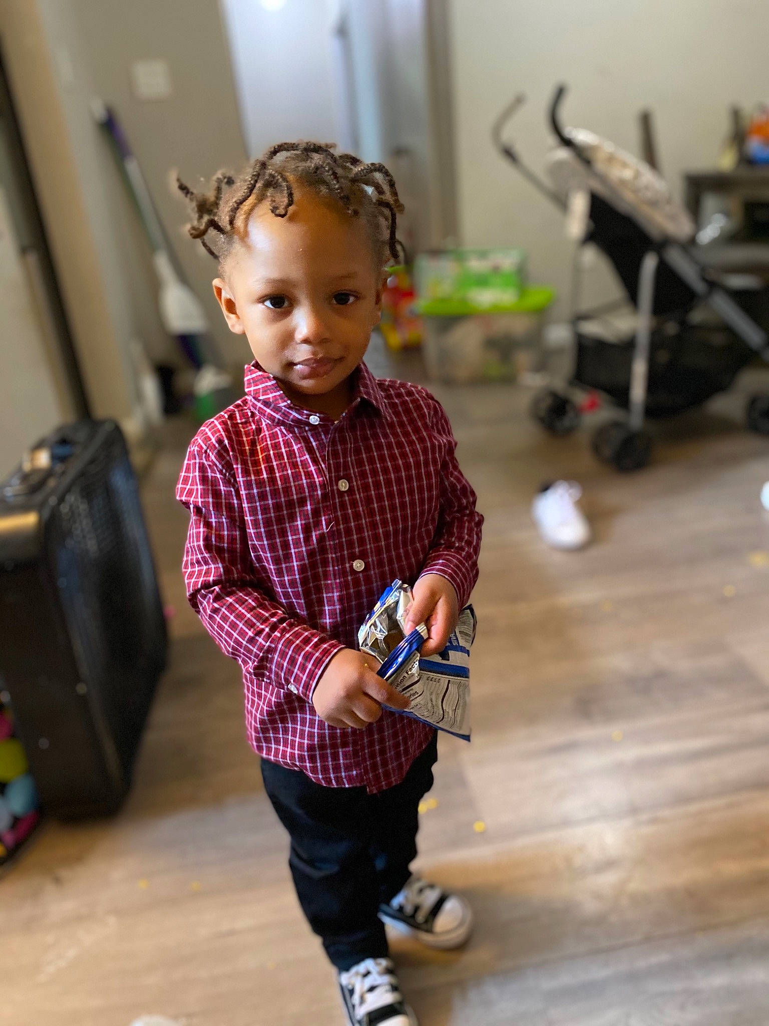Tyler joined the competition — help win amazing prizes! child, face, facial_expression, fashion_design, floor, flooring, fun, happy, hardwood, head, leisure, luggage_and_bags, pattern, person, shoulder, skin, sleeve, smile, street_fashion, toddler