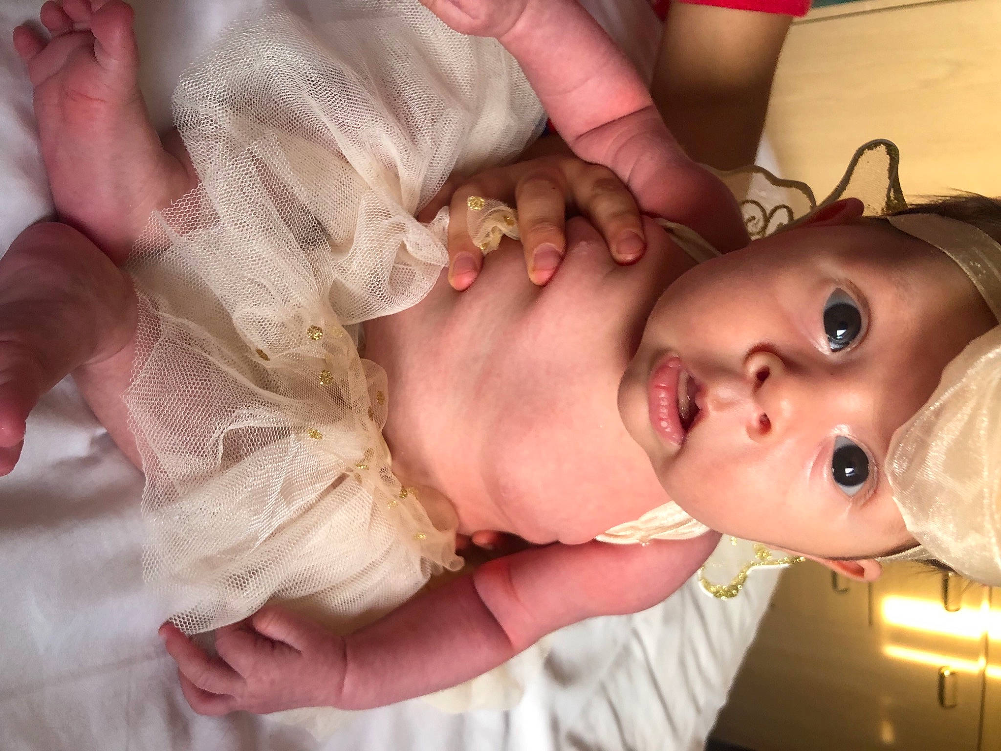 Ailani joined the competition — help win amazing prizes! baby, cheek, ear, eye, eyebrow, eyelash, face, finger, gesture, hand, happy, head, headgear, human_body, iris, lip, mouth, neck, nose, person