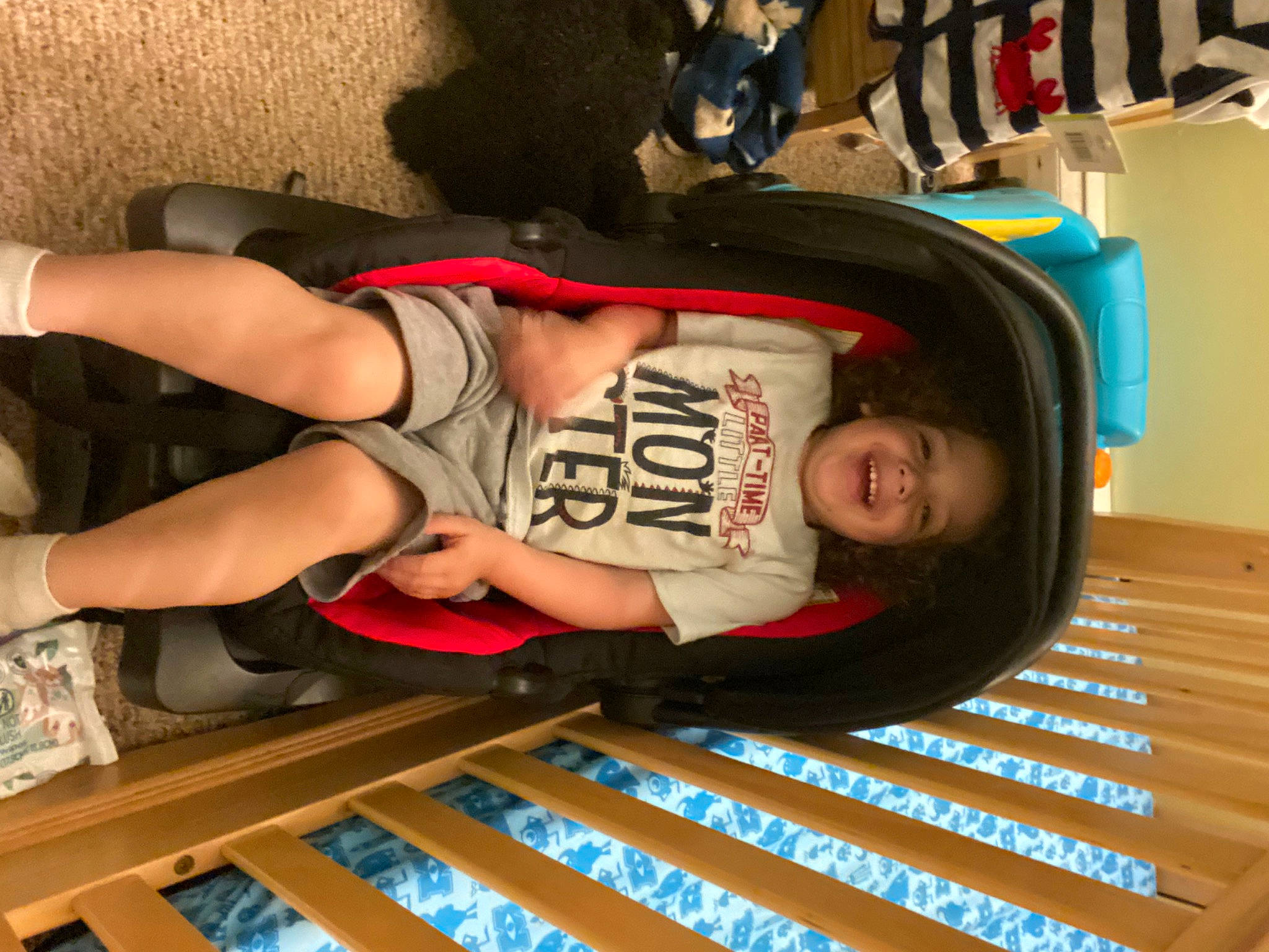 Jayce is registered to the contest to win money with this photo: beauty, child, elbow, flooring, foot, fun, hardwood, human_leg, joy, knee, person, room, sandal, shelf, t_shirt, thigh, tire, toddler, wheel, wood