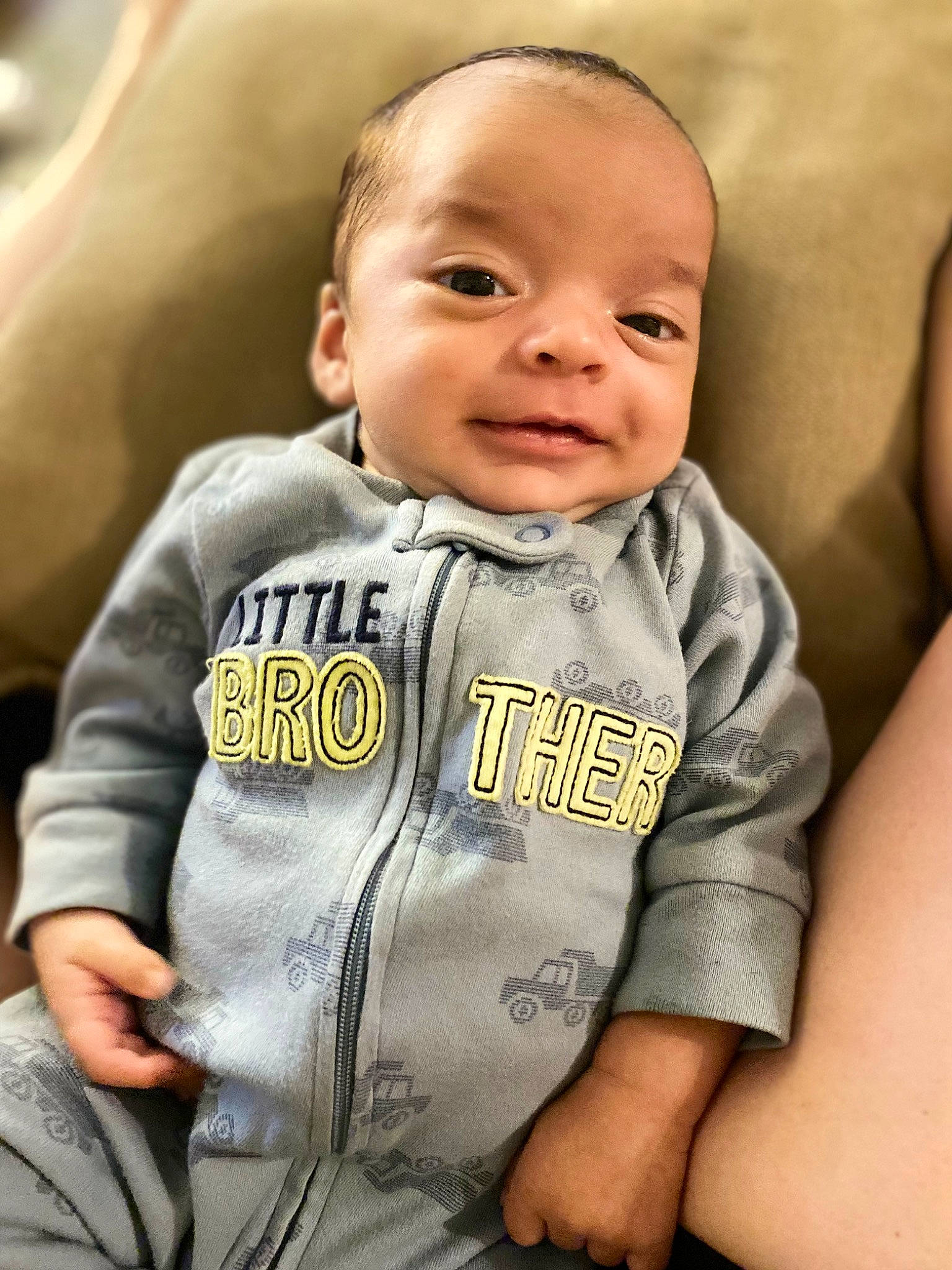 Elias is registered to the contest to win money with this photo: baby, baby_toddler_clothing, cheek, child, close_up, collar, comfort, cool, dress, face, flash_photography, gesture, happy, neck, nose, person, skin, sleeve, smile, t_shirt