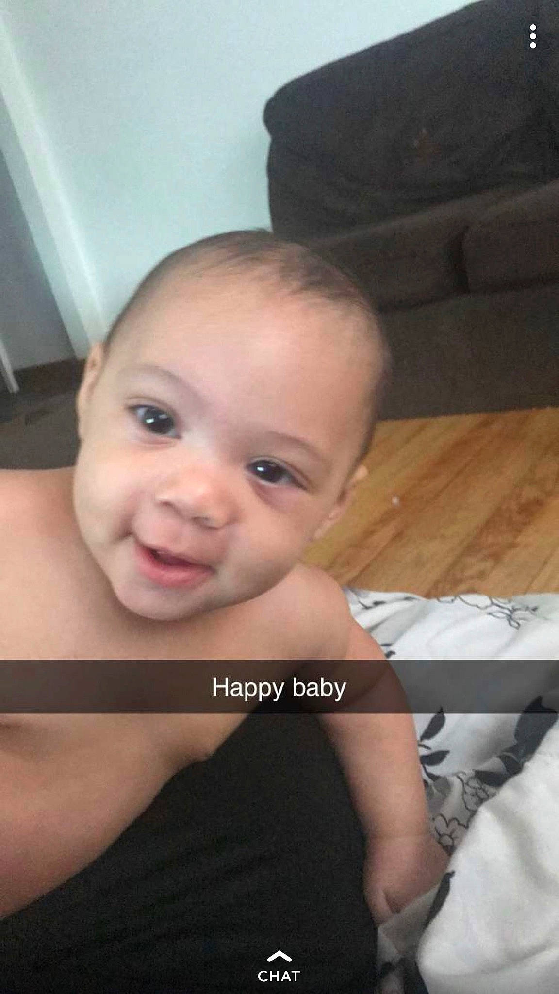 Savion is registered to the contest to win money with this photo: arm, baby, cheek, child, close_up, face, forehead, head, mouth, neck, nose, person, photography, sitting, smile, toddler