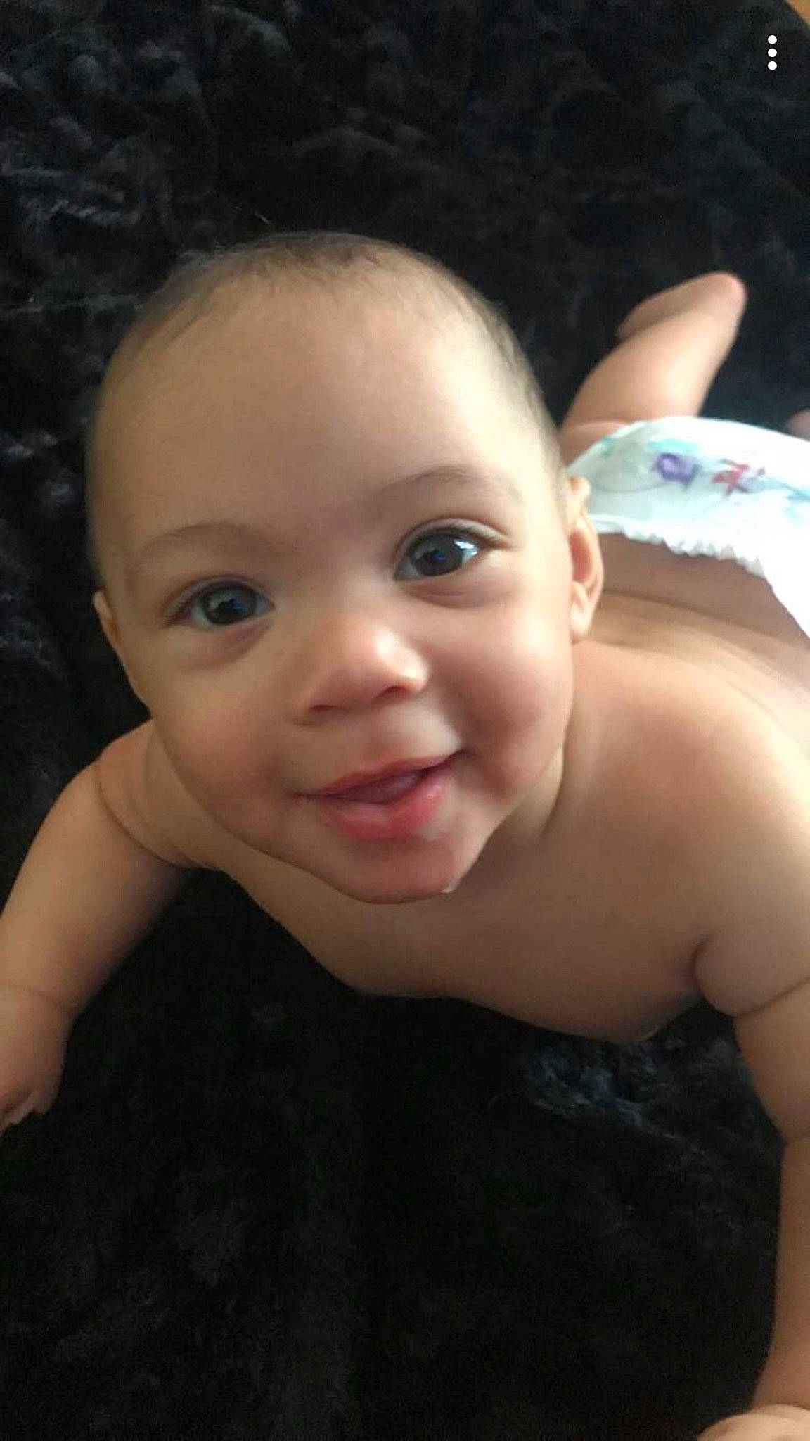 Savion is registered to the contest to win money with this photo: baby, beauty, cheek, child, chin, ear, eye, eyebrow, face, facial_expression, forehead, fun, head, lip, nose, person, skin, smile, toddler