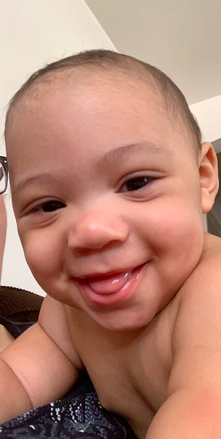 Savion is registered to the contest to win money with this photo: baby, baby_making_funny_faces, cheek, child, chin, close_up, ear, eye, eyebrow, face, facial_expression, forehead, hair, head, joy, lip, mouth, neck, nose, person