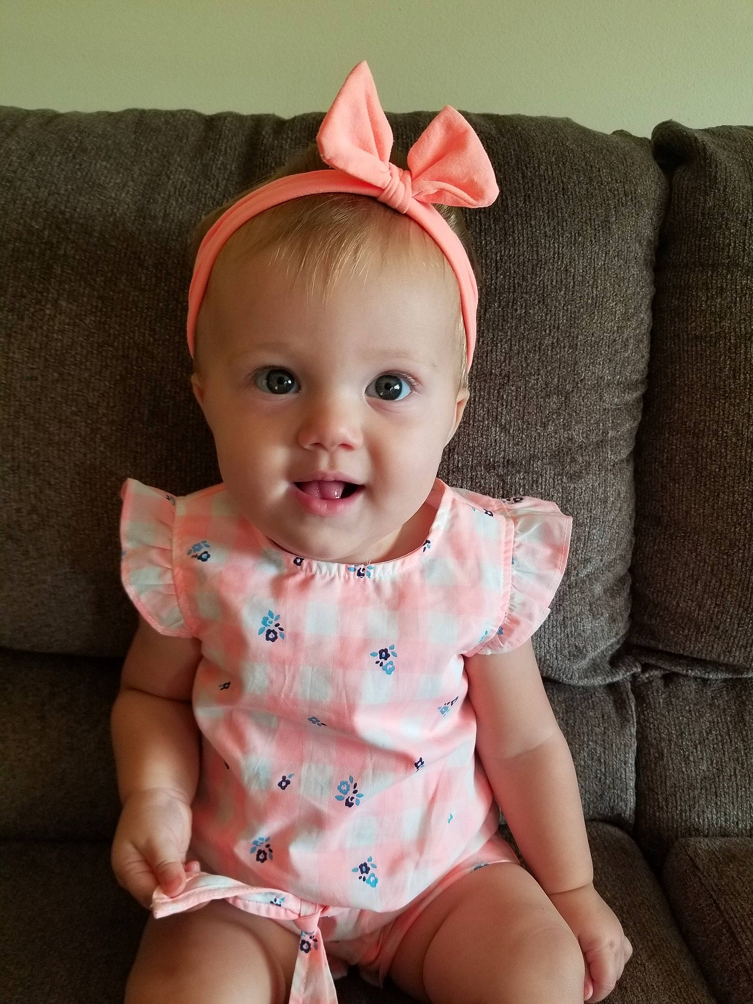 Caydence is registered to the contest to win money with this photo: baby, baby_toddler_clothing, cheek, child, design, ear, face, hair_accessory, head, headband, headgear, lip, organ, pattern, person, pink, product, sitting, skin, sleeve