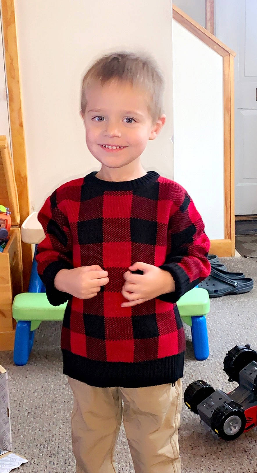 Brantley joined the competition — help win amazing prizes! baby_toddler_clothing, black, camera, camera_lens, child, door, fun, joint, joy, person, photograph, plaid, product, reflex_camera, single_lens_reflex_camera, sleeve, smile, standing, t_shirt, tartan