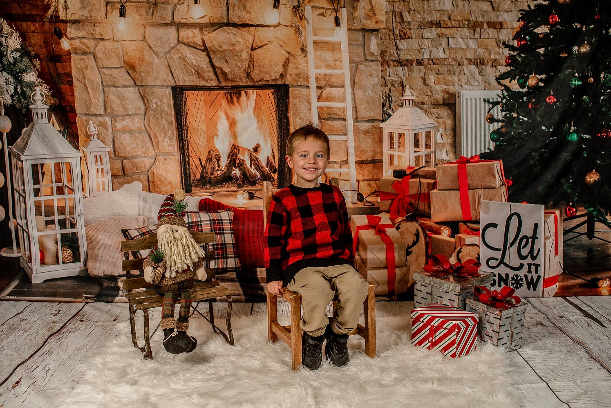Brantley joined the competition — help win amazing prizes! brick, christmas, christmas_decoration, christmas_tree, conifer, event, fun, holiday, home, joy, leisure, living_room, ornament, person, plaid, room, sitting, tartan, town, tree