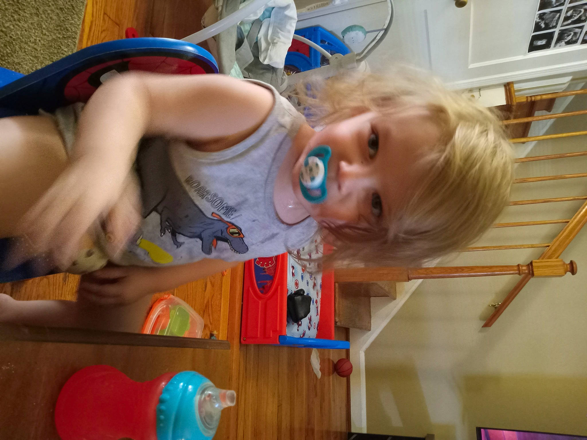 Man Man is registered to the contest to win money with this photo: baby, blue, child, fun, happy, leisure, mouth, person, play, room, smile, toddler, toy, vacation, visual_arts, wood