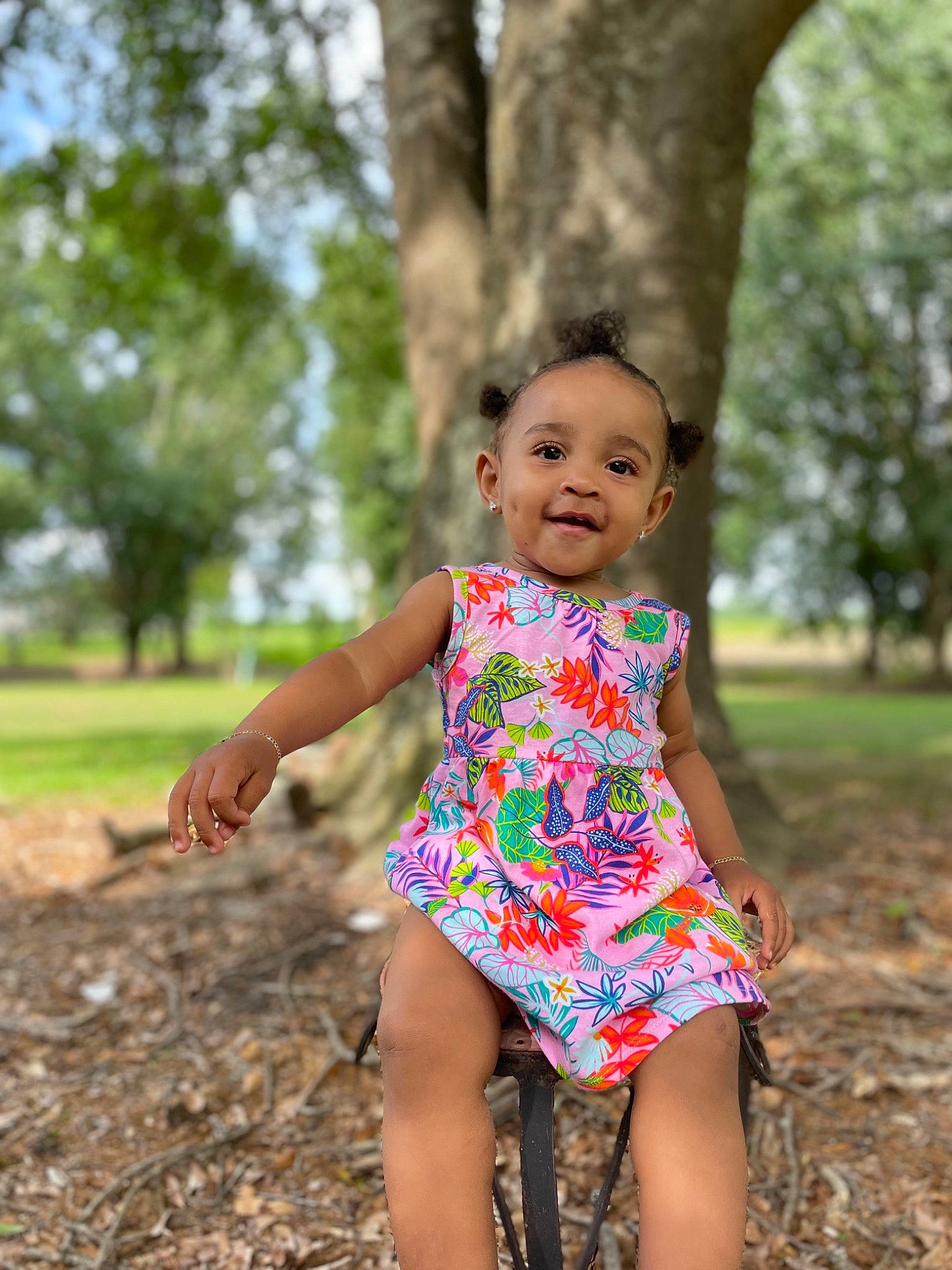 Aubrí joined the competition — help win amazing prizes! baby, baby_toddler_clothing, dress, flash_photography, fun, grass, happy, human_leg, joy, leaf, leisure, people_in_nature, person, pink, plant, sitting, skin, smile, thigh, toddler