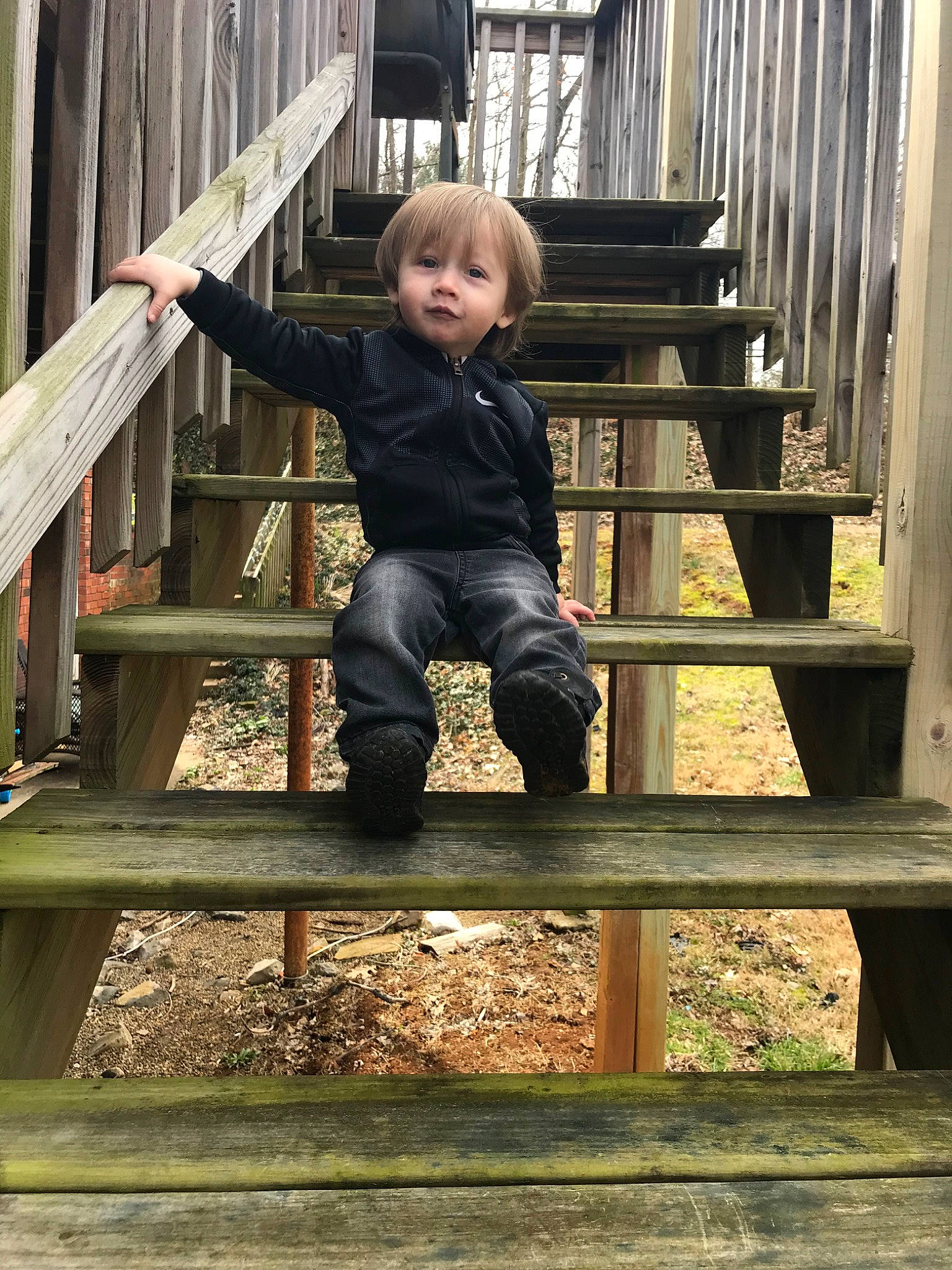 Enzo is registered to the contest to win money with this photo: child, person, play, sitting, smile, toddler, wood