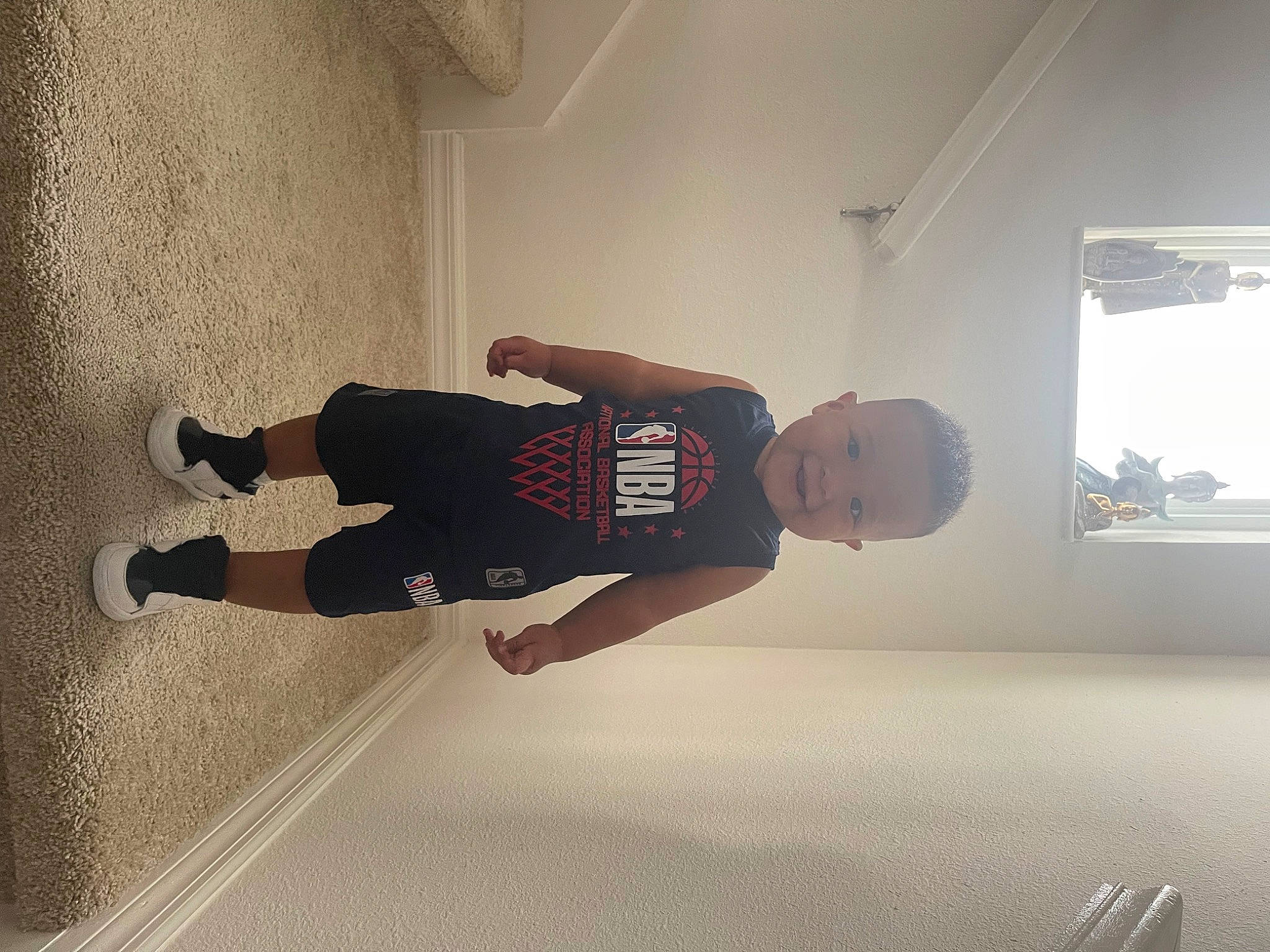 Christopher joined the competition — help win amazing prizes! ceiling, elbow, floor, flooring, fun, hardwood, human_leg, joy, knee, person, plaster, recreation, room, shadow, shorts, sportswear, t_shirt, thigh, waist, walking_shoe