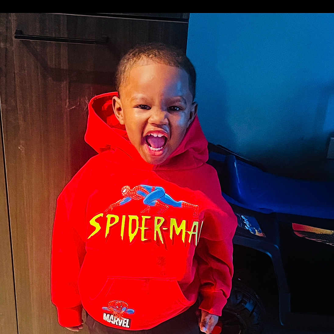 Ace is registered to the contest to win money with this photo: alloywheel, boy, car, child, clothing, coat, face, footwear, head, hoodie, jacket, knitwear, male, pants, person, photography, portrait, shoe, sweater, sweatshirt