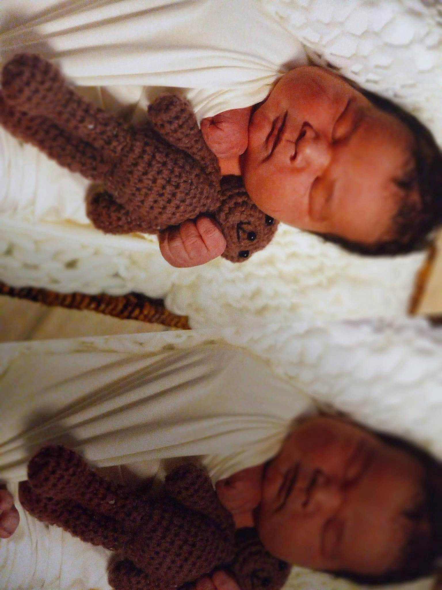 Aaron is registered to the contest to win money with this photo: baby, baby_sleeping, bed, child, comfort, happy, human, linens, mammal, nose, organ, pattern, people, person, room, skin, textile, toddler, white, wood