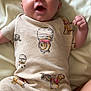 baby, infant, child, smiling, onesie, clothing, winnie_the_pooh, blanket, soft_fabric, cute, happy, portrait, laying_down, close_up, skin, head, face, hand, foot, indoors