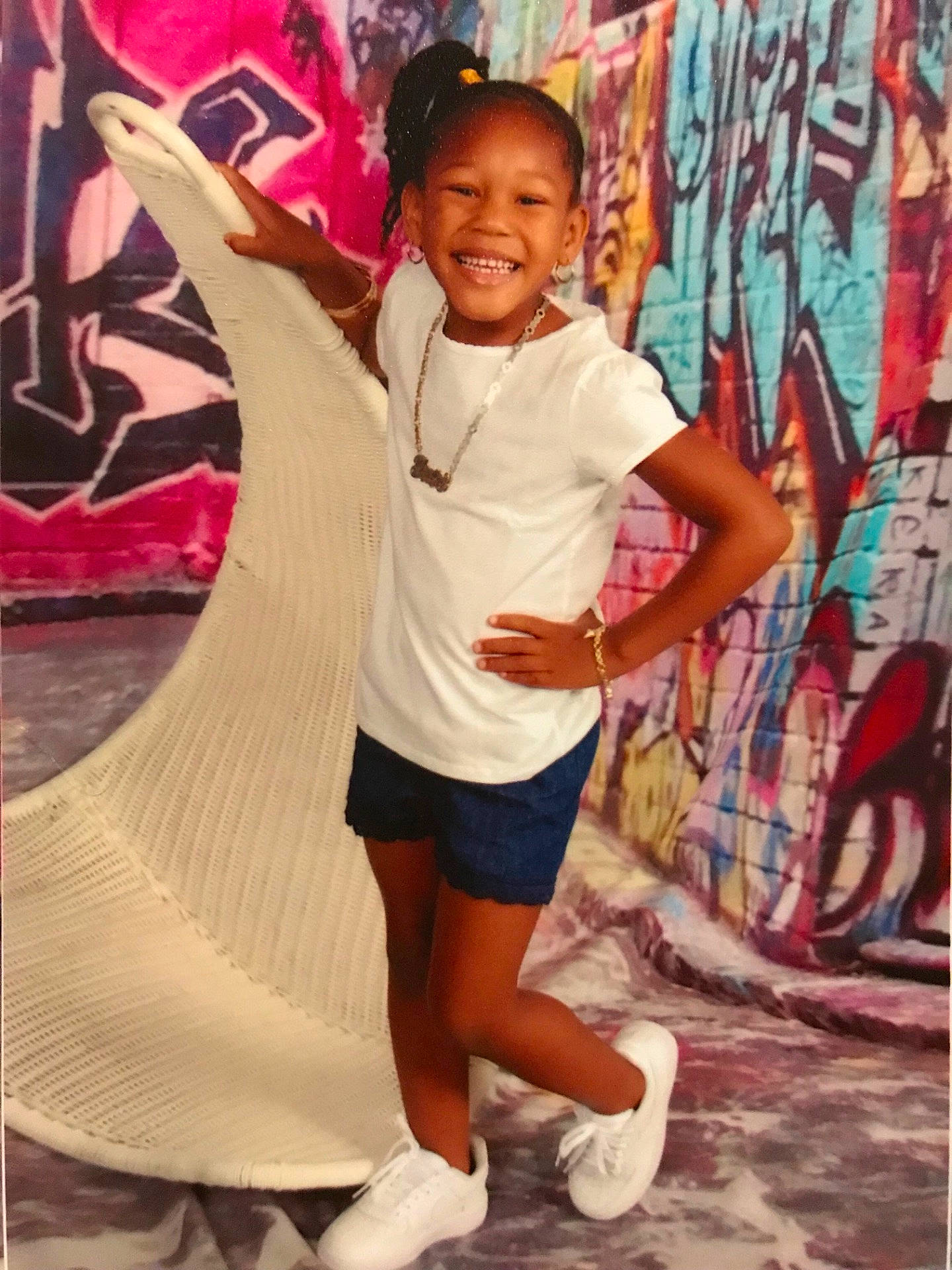 Wynter is registered to the contest to win money with this photo: abdomen, child, clothing, cool, day, footwear, fun, girl, happiness, joint, joy, leg, person, pink, product, shoe, shorts, shoulder, smile, textile