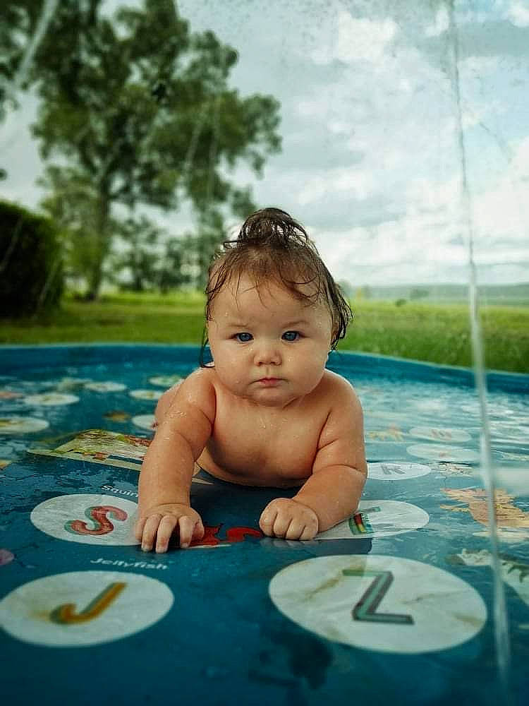 Alessia joined the competition — help win amazing prizes! baby, bathing, body_of_water, cheek, child, cloud, facial_expression, fun, grass, happy, leisure, people, person, product, recreation, skin, sky, summer, tableware, toddler