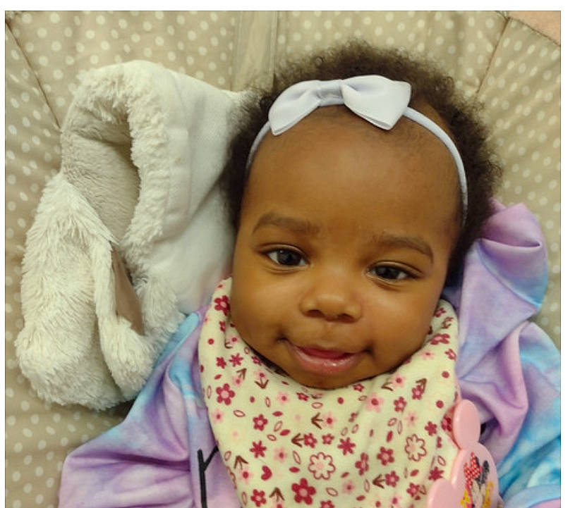 Laila joined the competition — help win amazing prizes! baby, baby_toddler_clothing, cheek, child, comfort, eyelash, fashion_accessory, fur, happy, laugh, linens, person, polar_fleece, portrait_photography, sleeve, smile, textile, toddler