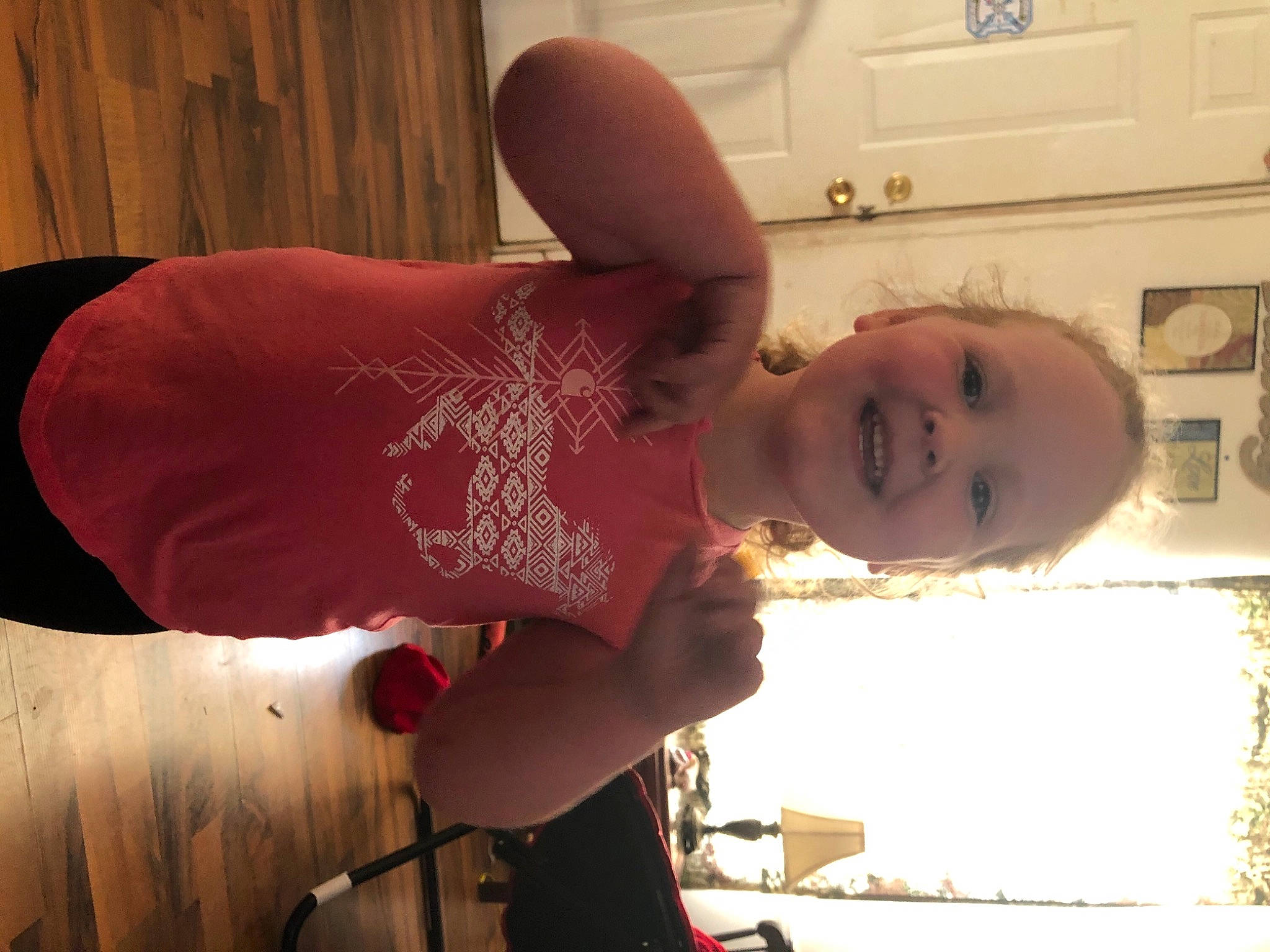 Emerie is registered to the contest to win money with this photo: abdomen, chest, curtain, door_handle, elbow, flesh, joy, light_switch, mouth, muscle, neck, person, power_plugs_and_sockets, shoulder, stomach, throat, trunk, wall_socket, wrist