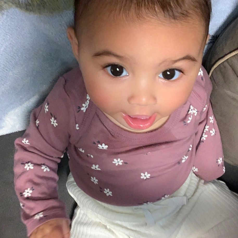 Phoenix joined the competition — help win amazing prizes! arm, baby_toddler_clothing, cheek, chin, eye, eyebrow, facial_expression, hair, hairstyle, head, human_body, iris, lip, mouth, nose, outerwear, pink, skin, sleeve, smile