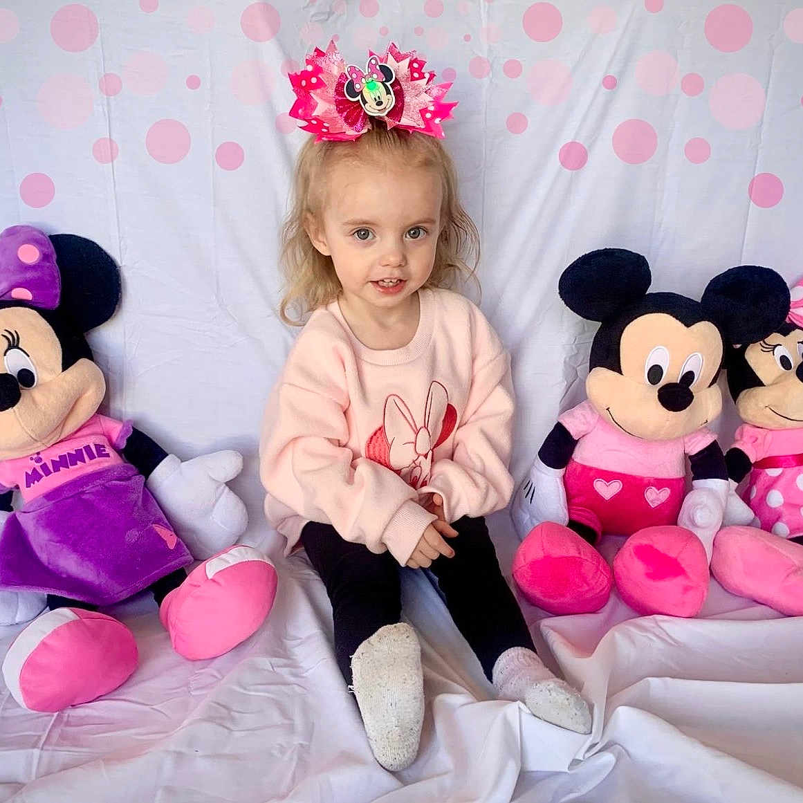 Naomi joined the competition — help win amazing prizes! baby, clothing, couch, cushion, face, furniture, head, homedecor, hosiery, people, person, photography, pillow, plush, portrait, purple, sitting, sock, teddybear, toy