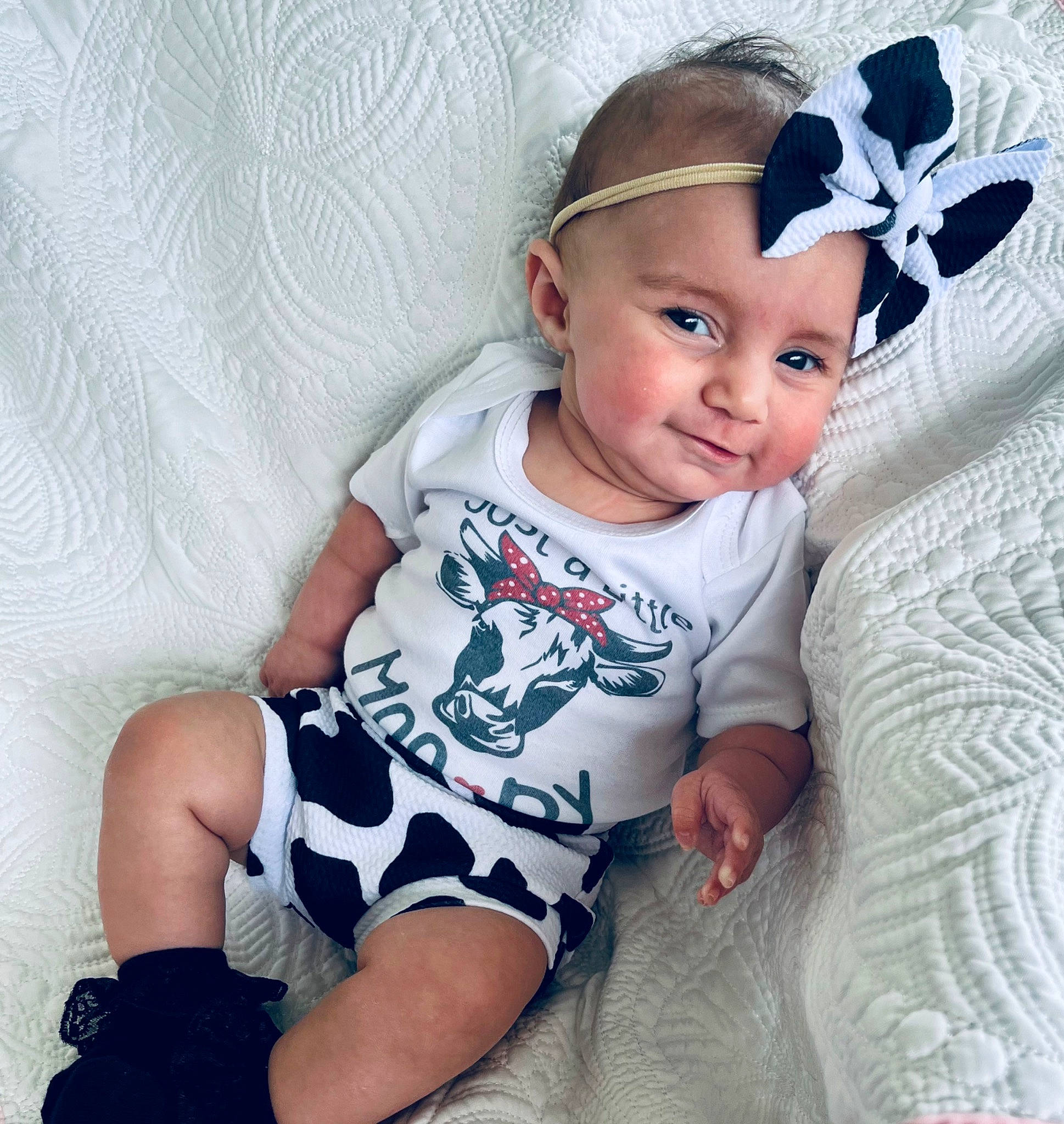 Summer Lee is registered to the contest to win money with this photo: baby, baby_toddler_clothing, child, comfort, cool, costume_hat, eye, eyelash, finger, happy, head, headwear, iris, neck, pattern, person, skin, sleeve, smile, t_shirt