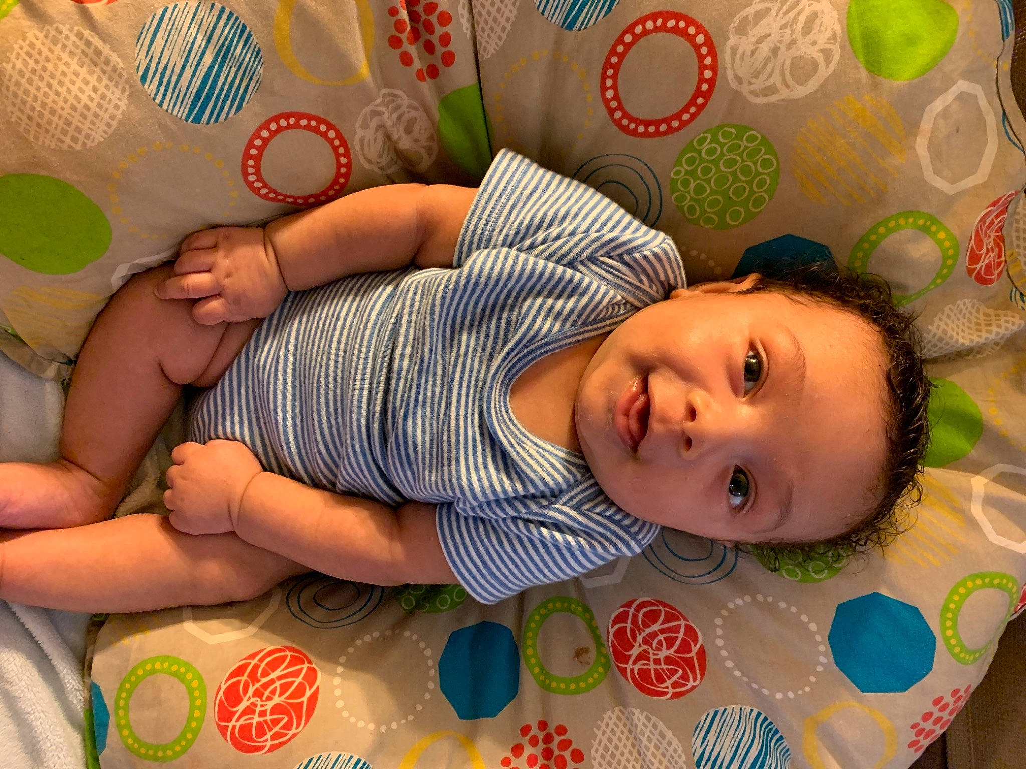 Adrien is registered to the contest to win money with this photo: baby, baby_products, baby_toddler_clothing, beauty, cheek, child, comfort, eye, green, happy, head, human_body, linens, mammal, nose, pattern, person, pink, skin, smile