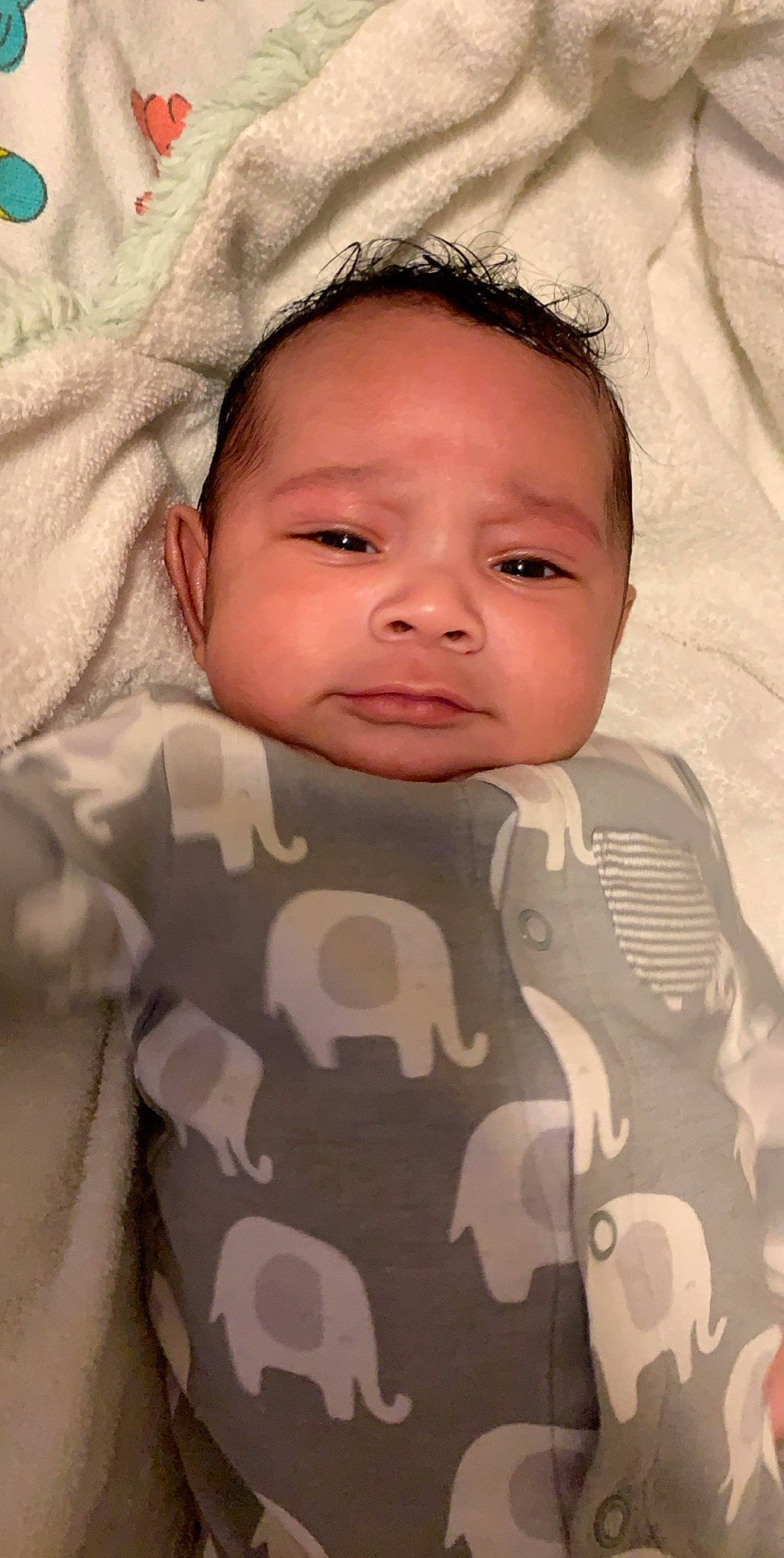 Trevor is registered to the contest to win money with this photo: baby, cheek, child, chin, eye, eyebrow, face, forehead, head, lip, mouth, nose, person, skin, smile, toddler