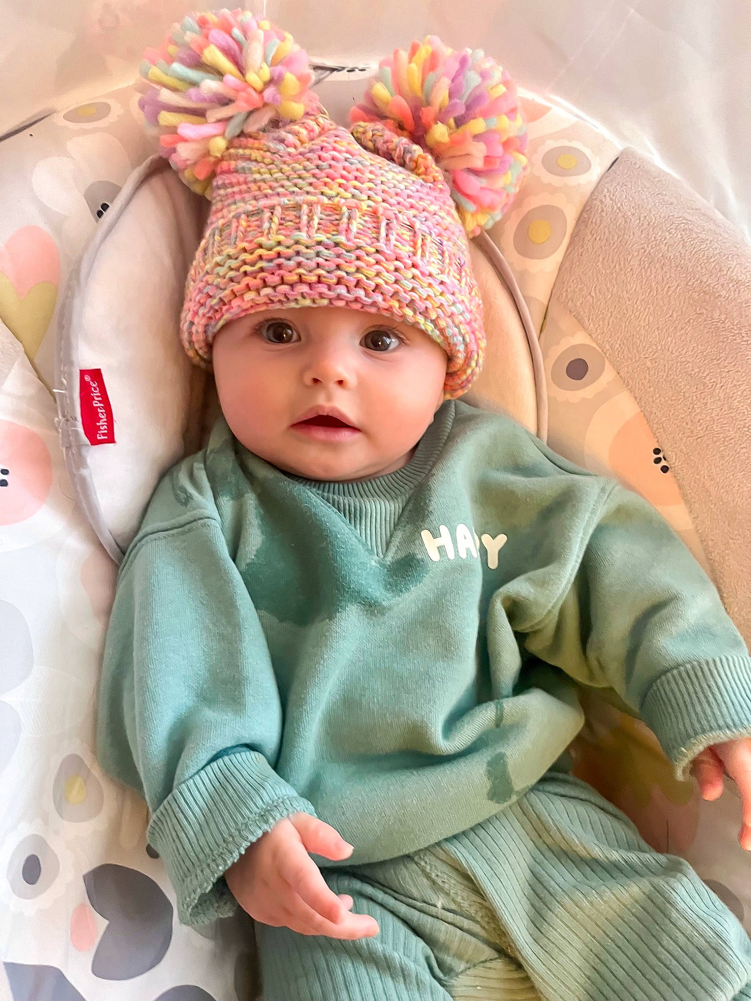 Madden is registered to the contest to win money with this photo: baby, baby_products, baby_sleeping, baby_toddler_clothing, cap, cheek, child, comfort, eye, face, fashion_accessory, head, headwear, knit_cap, linens, pattern, person, pink, skin, sleeve