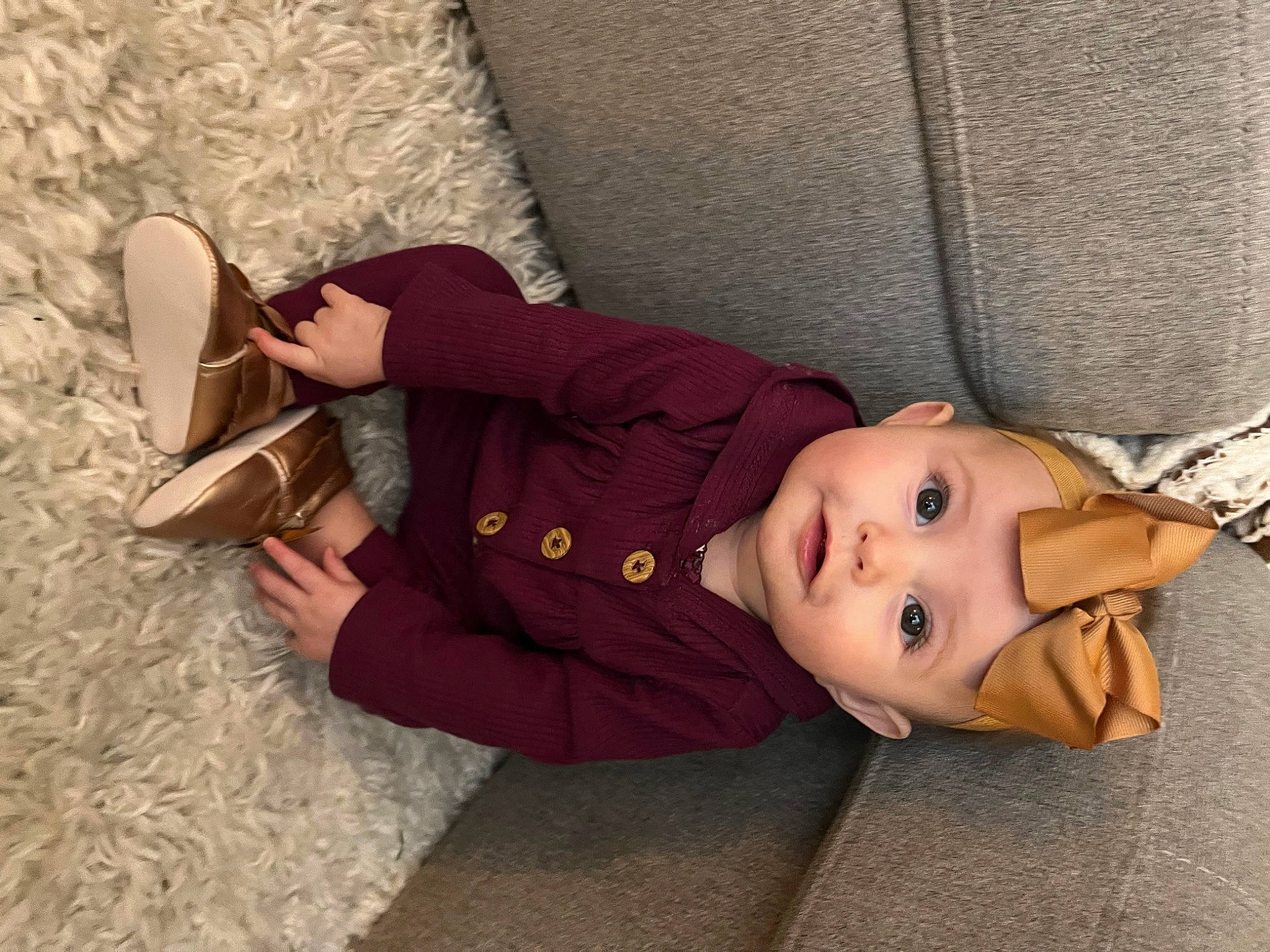 Madden joined the competition — help win amazing prizes! baby, baby_toddler_clothing, carmine, child, comfort, flooring, foot, fur, grass, human_body, human_leg, linens, mammal, person, personal_protective_equipment, plant, sitting, skin, toddler, tree