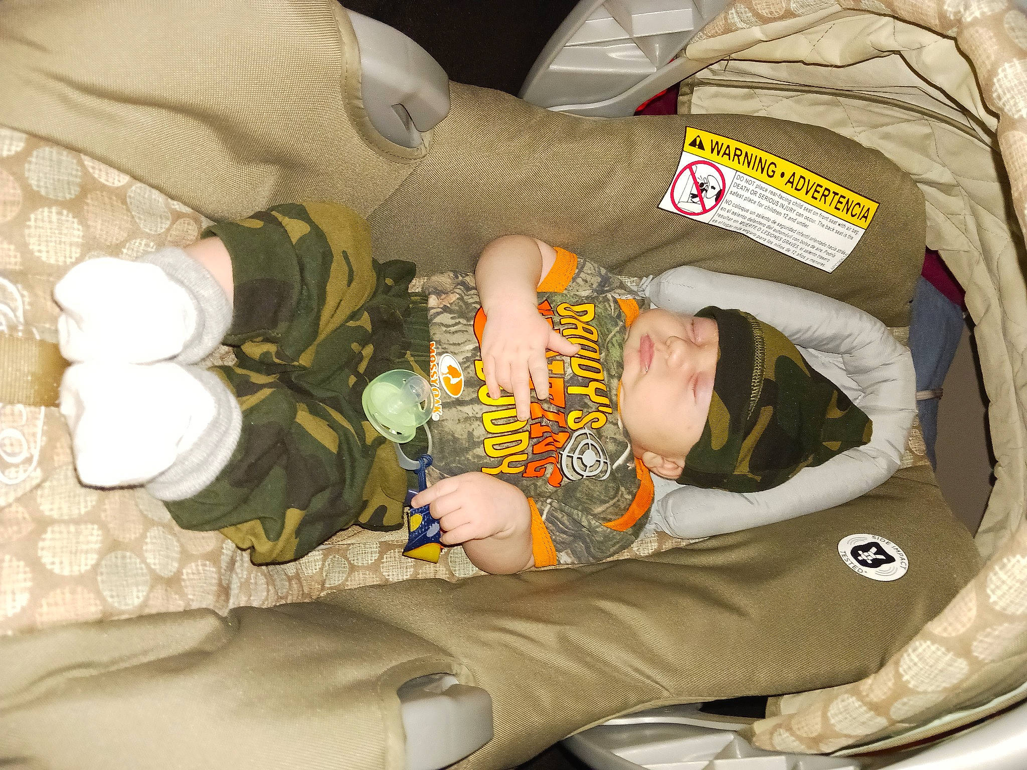 Kaiden joined the competition — help win amazing prizes! baby, baby_carriage, baby_products, baby_safety, baby_toddler_clothing, car_seat, carmine, child, comfort, gesture, headwear, lap, linens, pattern, person, room, sitting, sleep, sleeve, smile