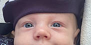 Mathis participe au concours pour gagner de l'argent avec cette photo : baby, face, blue_eyes, hat, striped_hat, clothing, smile, close_up, infant, cute, soft_blanket, patterned_outfit, child, headwear, portrait, happy, cozy, young_child, wearing, looking