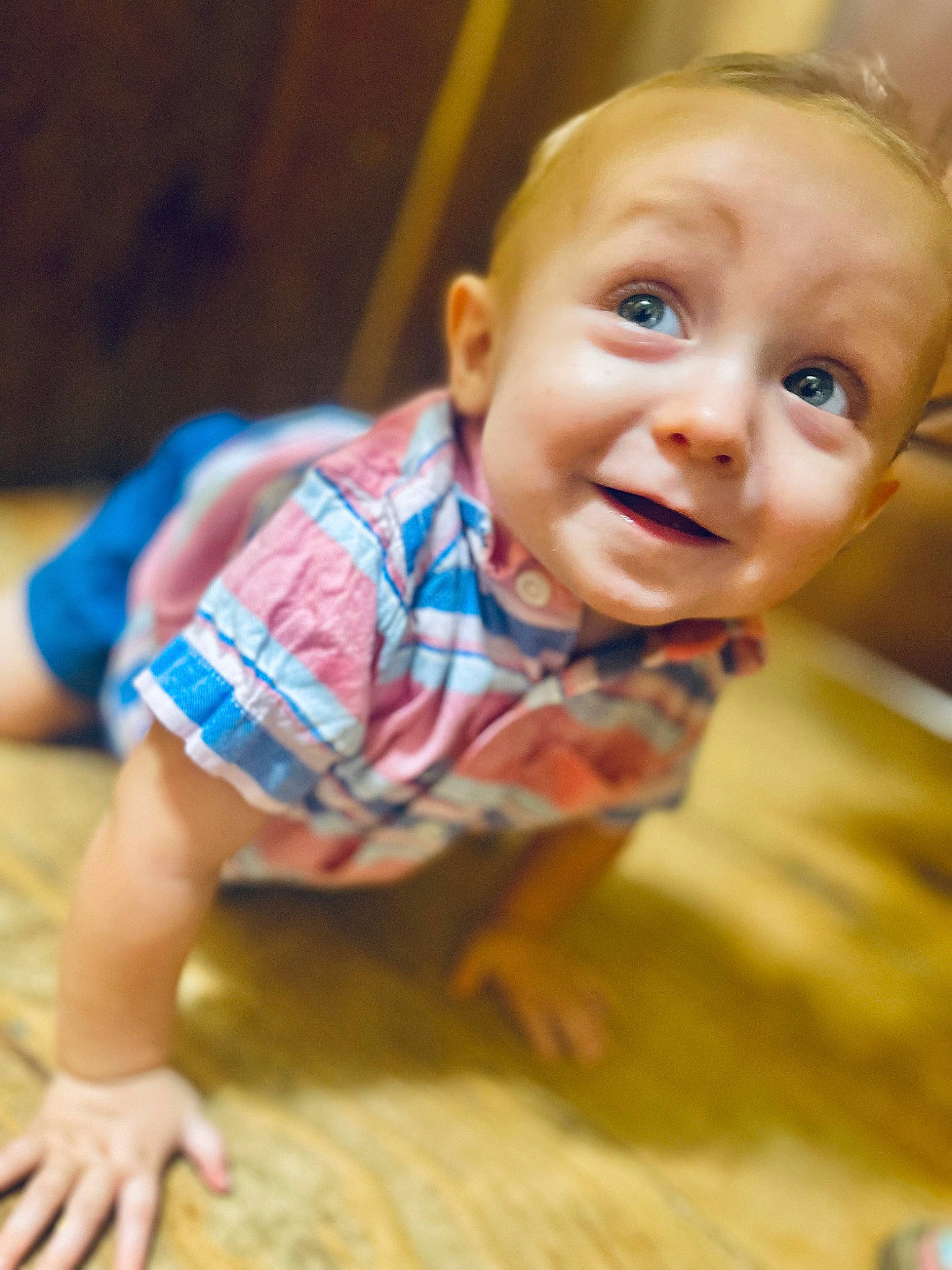 Jaxxon is registered to the contest to win money with this photo: baby, baby_toddler_clothing, cheek, child, floor, flooring, fun, happy, hardwood, human_body, iris, joy, lip, nose, person, sitting, skin, sleeve, smile, t_shirt