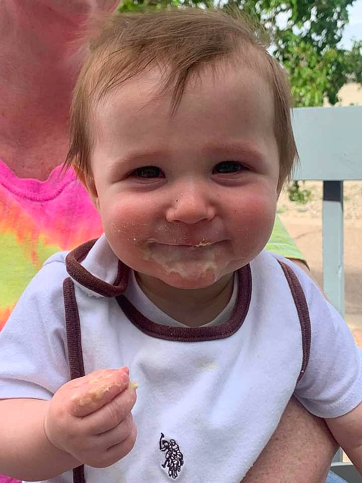 Danny is registered to the contest to win money with this photo: cheek, chin, eyelash, facial_expression, finger, gesture, grass, hand, happy, human, iris, joy, lip, mouth, nose, people, person, pink, skin, sleeve