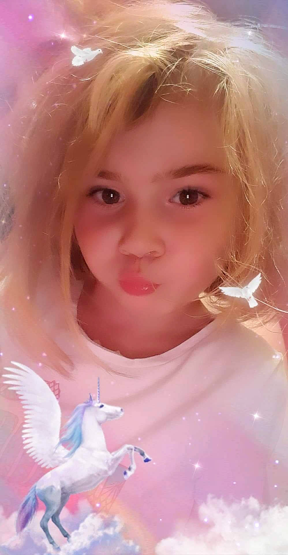 Oceane  participe au concours pour gagner de l'argent avec cette photo : beauty, blond, cheek, child, close_up, doll, eye, face, girl, head, human_hair_color, infant, iris, lip, long_hair, mouth, nose, person, pink, skin