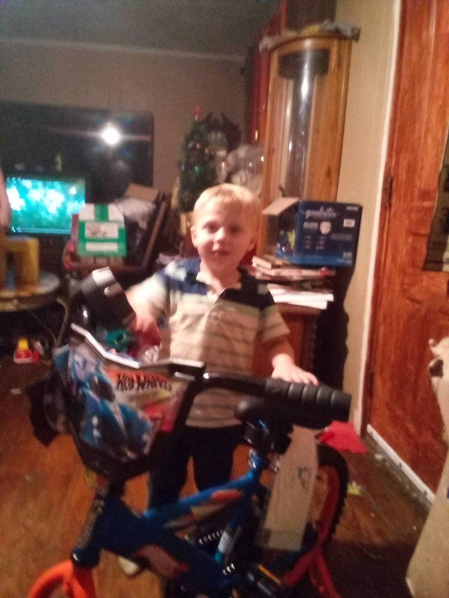 Josiah joined the competition — help win amazing prizes! bicycle, bicycle_fork, bicycle_frame, bicycle_handlebar, bicycle_part, bicycle_saddle, bicycle_tire, bicycle_wheel, child, flooring, person, picture_frame, recreation, shorts, smile, spoke, t_shirt, television, tire, toddler