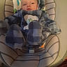 baby, infant, onesie, blue, checkered, plush, baby_seat, striped, cushion, face, head, person, child, indoors, cute, apparel, soft, warm, comfort, expression