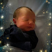Dackelynne joined the competition — help win amazing prizes! newborn, baby, sleeping, blanket, bed, stars, sparkles, dark_clothing, infant, portrait, peaceful, sleep, wrapped, cozy, soft_light, indoors, cute, serene, child, star_effect