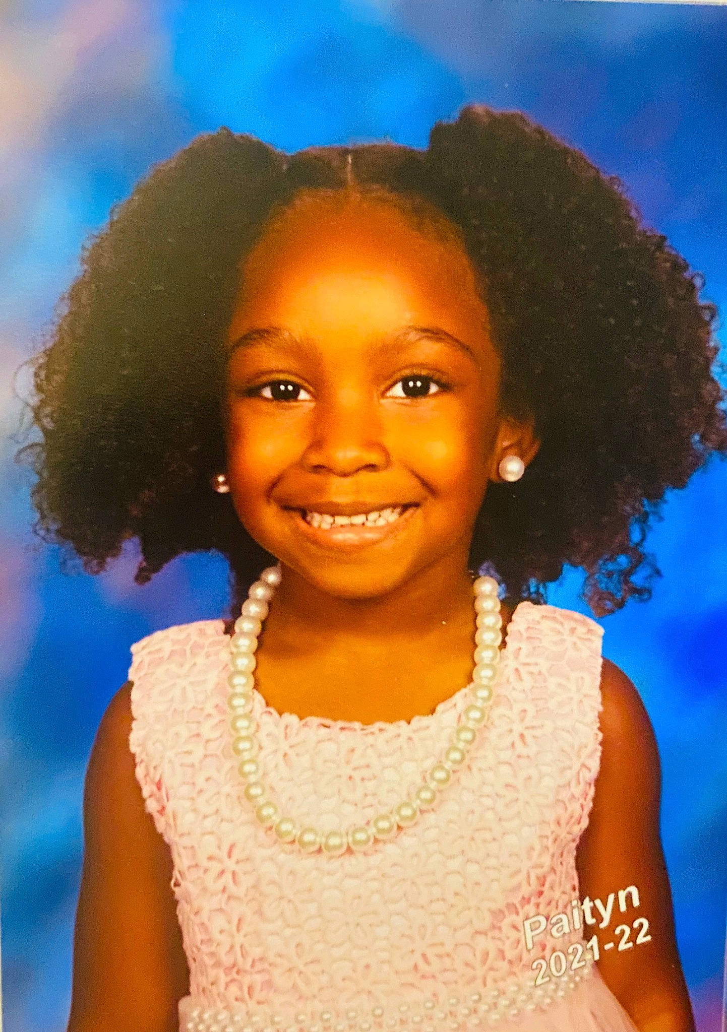 Paityn is registered to the contest to win money with this photo: afro, black_hair, chin, cool, eyebrow, face, flash_photography, fun, happy, human, jheri_curl, joy, leisure, lip, long_hair, person, ringlet, skin, sky, smile