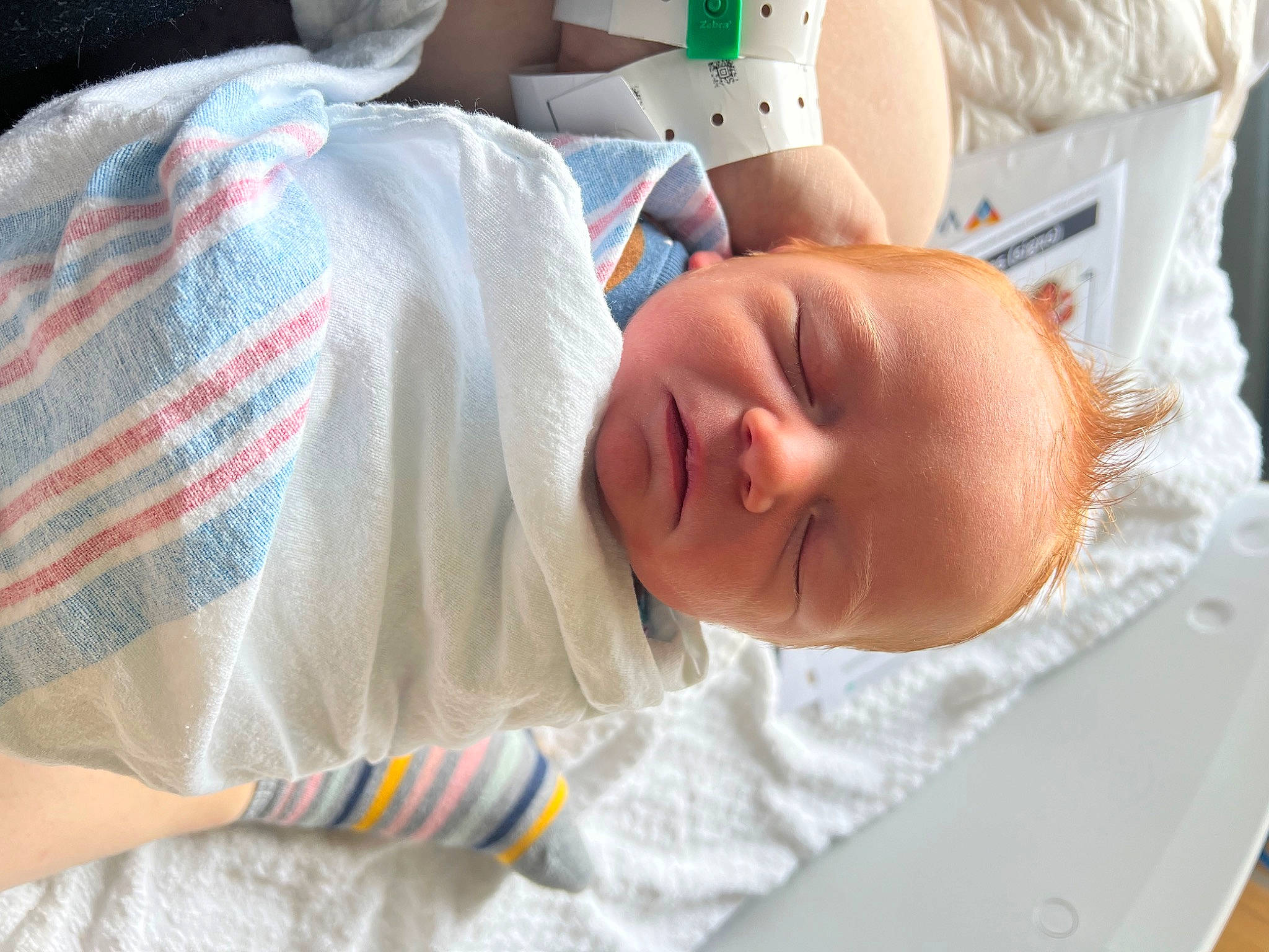 Ashton is registered to the contest to win money with this photo: baby, baby_products, baby_safety, baby_sleeping, baby_toddler_clothing, bedding, bedtime, child, childbirth, comfort, event, hospital, hospital_bed, linens, nap, pattern, person, room, skin, sleep