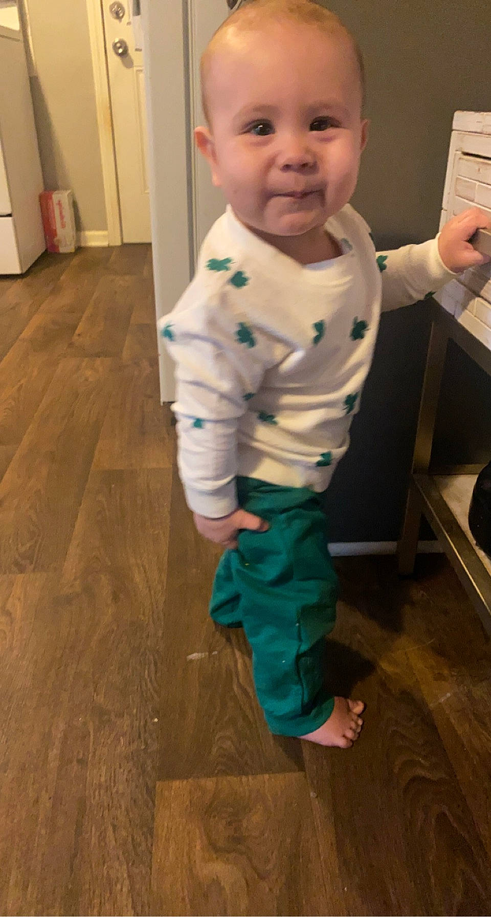 Kaydan joined the competition — help win amazing prizes! baby, baby_toddler_clothing, cheek, child, elbow, floor, flooring, foot, fun, hairstyle, hardwood, human_leg, person, room, sitting, skin, sleeve, smile, thumb, toddler